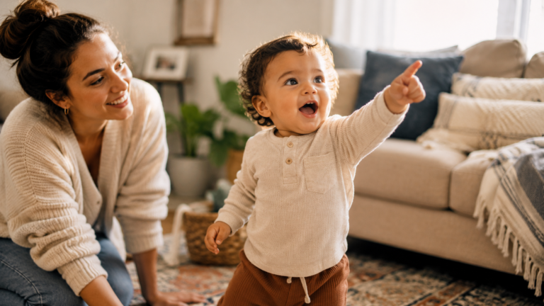joyful 18 month old in living room with mother